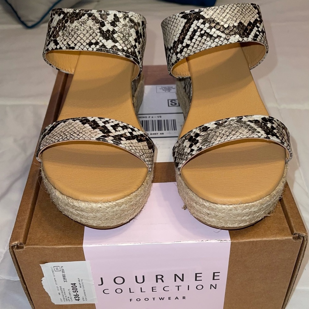 Journee Collection black wedge size 9 , brand new in its box .